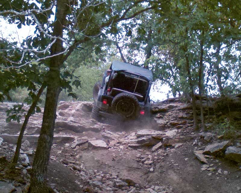 Jeep at the top of rock hill